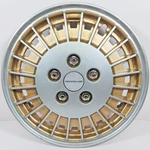 One 1985-1989 Pontiac Grand Am # 5086G Gold & Silver 13" Hubcap / Wheel Cover. Fixed Price $19.99.