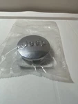 Genuine Mopar Wheel Center Cap 1LB77SZ0AC. Fixed Price $39.99.