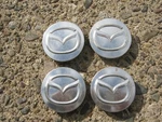 Factory 2010 Mazda 3 Polished Wheel Center Hubcaps. Fixed Price $30.80.