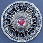 One 1977-1980 Pontiac Sunbird / Astre 13" Wire Spoke Hubcap Wheel Cover. Fixed Price $42.99.