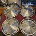 Set Of Four Plymouth 1959 Pointed Center Wheel Covers. Fixed Price $99.95.