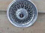 One Oem 1980-1982 Oldsmobile Cutlass 14" Rwd Wire Spoke Hubcap Wheel Cover. Fixed Price $40.00.