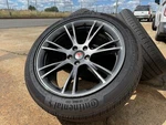 Four Oem 2025 Tesla Model Y Wheel Gemini Charcoal Rim Continental Tire 10%. Fixed Price $1000.00.