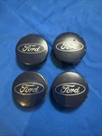 Set Of Four Ford Fusion Focus Fiesta Escape Edge Oem Center 6M21-1003-AA. Fixed Price $24.00.