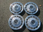 Factory 1980 1988 Mercury Cougar 14 Inch Wire Spoke Hubcaps Wheel Covers. Fixed Price $264.00.