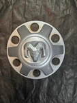 Dodge Ram 1500 Oem Silver Center Cap #6CW52S4AAA. Fixed Price $30.00.