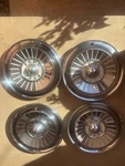 Set Of Four 1957 Ford Galaxie Fairlane T-bird Wheel Covers. Fixed Price $100.00.