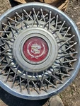 Set Of Two 1985 1987 Cadillac Deville Locking 14 Inch Wire Spoke Hubcap. Fixed Price $160.00.