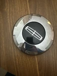 2003-2005 Lincoln Aviator Center Cap Used Normal Wear Pc, Part # 2C54-1A096-BC. Fixed Price $19.00.
