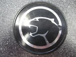 One (1) Oem Mercury Cougar Wire Wheel Cover Emblem ES3C-1A040-AA 7067. Fixed Price $35.00.