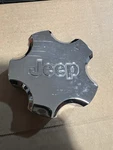 Used Single Bright Chrome Center Cap 2003 2004 Jeep Grand Cherokee 52080334AA. Fixed Price $14.99.