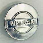 Factory Nissan Center Caps. 40342-40U10 Oem. Fixed Price $10.00.