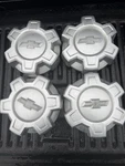 4 Factory Wheel Center Caps Fits 19-25 Silverado 17" Steel New Genuine Gm. Fixed Price $100.00.