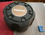 #e 1) 1986-1993 Mazda B2600 Wheel Center Cap Hub Oem S232 37 191. Fixed Price $19.95.