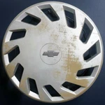 One 1987-1988 Chevrolet Spectrum # 3189 13" Silver Hubcap Wheel Cover 94439074. Fixed Price $19.99.