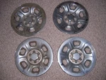 Four 15" Used Wheel Covers From 2015 Nissan Frontier Chrome Style 2005-2019. Fixed Price $40.00.