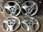 (4) Oem 2003-05 Pontiac Sunfire 15" Silver Hubcaps Wheel Covers #5131B 9596523. Fixed Price $169.00.