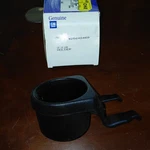 Gm 25640468 Holder Assembly, Front Floor Console Cup. Fixed Price $60.00.