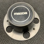 Mazda Series Navaho F17A-1A096-AA Oem Wheel Center Rim Cap Hub Lug Cover Gray. Fixed Price $19.99.