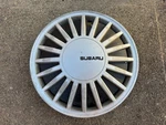 (1) 1989-1994 Subaru Loyale 13-INCH Hubcap, Oem, Plastic, Part# SOA-4721302. Fixed Price $20.00.