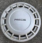 Single Used Mitsubishi Precis (1990, 1991, 1992) 13" Hubcap, 52960-24400. Fixed Price $20.00.