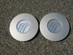 Genuine 1992 To 1995 Mercury Sable Alloy Wheel Hubcaps Center F24C-1A096-AA. Fixed Price $22.00.