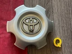 #q 1) 2005-2007 Toyota Sequoia Tundra Oem Center Hub Cap 42603-AF060 Hol. 69465. Fixed Price $24.95.