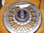 83 84 85 86 Marquis Wheel Cover Wire Design. Fixed Price $73.01.