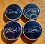 Ford Taurus Center Cap Set Of 4, 2010-2012 Part # 97BG 1000 Ad. Fixed Price $64.95.