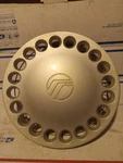 Oem 14 Inch Silver Hubcap, Wheel Cover 20 Holes Painted 98 Mercury Tracer. Fixed Price $39.14.