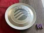 #m (1) 2003-11 Mercury Grand Marquis Center Silver Cap Replaces 6W33-1A096-AB. Fixed Price $36.95.