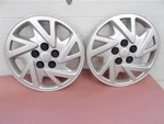 Pontiac Sunfire 2000-2005 Hub Cap Wheel Covers Pair 14" Silver Plastic W/ Lugs. Fixed Price $42.30.