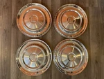 1957 Dodge Royal Lancer Knight #1732320 Hubcap Wheel Covers Set (16-91). Fixed Price $58.00.