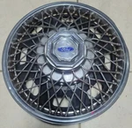 (1) Oem Dealer Option 1984-1985 Ford Tempo 13" Wire Spoke Hubcap Wheel Cover #0A. Fixed Price $44.99.