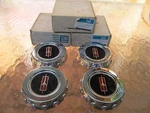 Nos 1979 Oldsmobile Cutlass ? Wire Wheel Center Caps Set Of 4 22506878. Fixed Price $259.99.