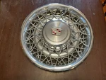 1- ONLY,1975-77 Cadillac Wire Hubcap, #2017-A. Fixed Price $75.00.