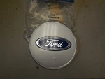 Nos 1987 - 1989 Ford Taurus Wheel Center Applique. Fixed Price $19.99.