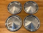 Pretty Set Of 1959 Plymouth 14 Inch Hubcaps Wheel Covers. Fixed Price $200.00.