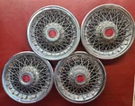 1977-1981 Pontiac Grand Prix 14" Wire Spoke Hubcaps Wheel Covers Set. Fixed Price $106.25.