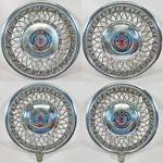 1986-1988 Oldsmobile Calais / Firenza # 4102 13" Wire Wheel Covers 22534706 Set. Fixed Price $199.99.