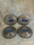 (4) 1991-1992 Ford Crown Victoria Oem Nos Center Caps Gun Metal PN:F2AC-1A096-BB. Fixed Price $100.00.