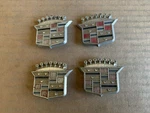 Cadillac 10661 Wheel Cover Center Emblem Oem Used Set. Fixed Price $34.99.