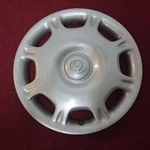 Mazda Protege, 323 : 1995, 1996, 1997, Silver, 13-INCH Factory Hubcap. Fixed Price $35.00.