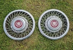 2 1985 Cadillac Deville Seville Fwd 14" Wire Spoke Locking Wheel Covers Hubcaps. Fixed Price $69.00.