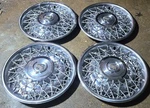 Set Of 4 1975-85 Cadillac Fleetwood Brougham 15" Wire Spoke Hubcaps Wheel Covers. Fixed Price $249.99.
