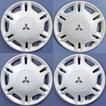 1997-1999 Mitsubishi Mirage 57561 13" Hubcaps Wheel Covers SET/4 # 38842031. Fixed Price $69.99.