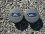 Factory 2001 2007 Ford Escape Center Hubcaps YL84-1130-FA. Fixed Price $17.60.