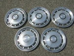Genuine Factory 1975 1982 Ford Granada Mercury Monarch Hubcaps Wheel Covers. Fixed Price $52.80.