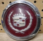 One 1981-1985 Cadillac Eldorado Seville 15" Wire Hubcap Center Gold Wreath. Fixed Price $16.95.