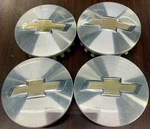 All 4 Silver Chevrolet Gm Center Caps Gold Bow Tie 09597551. Fixed Price $40.28.
